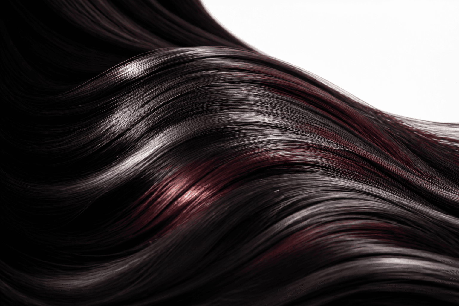 Abstract glossy hair texture with garnet accents